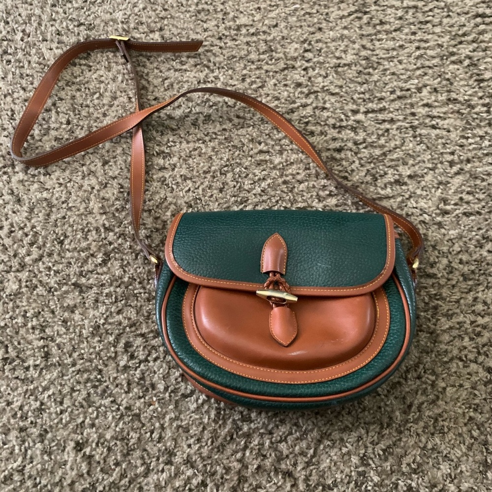 Brown and Hunter green purse. Slightly worn.